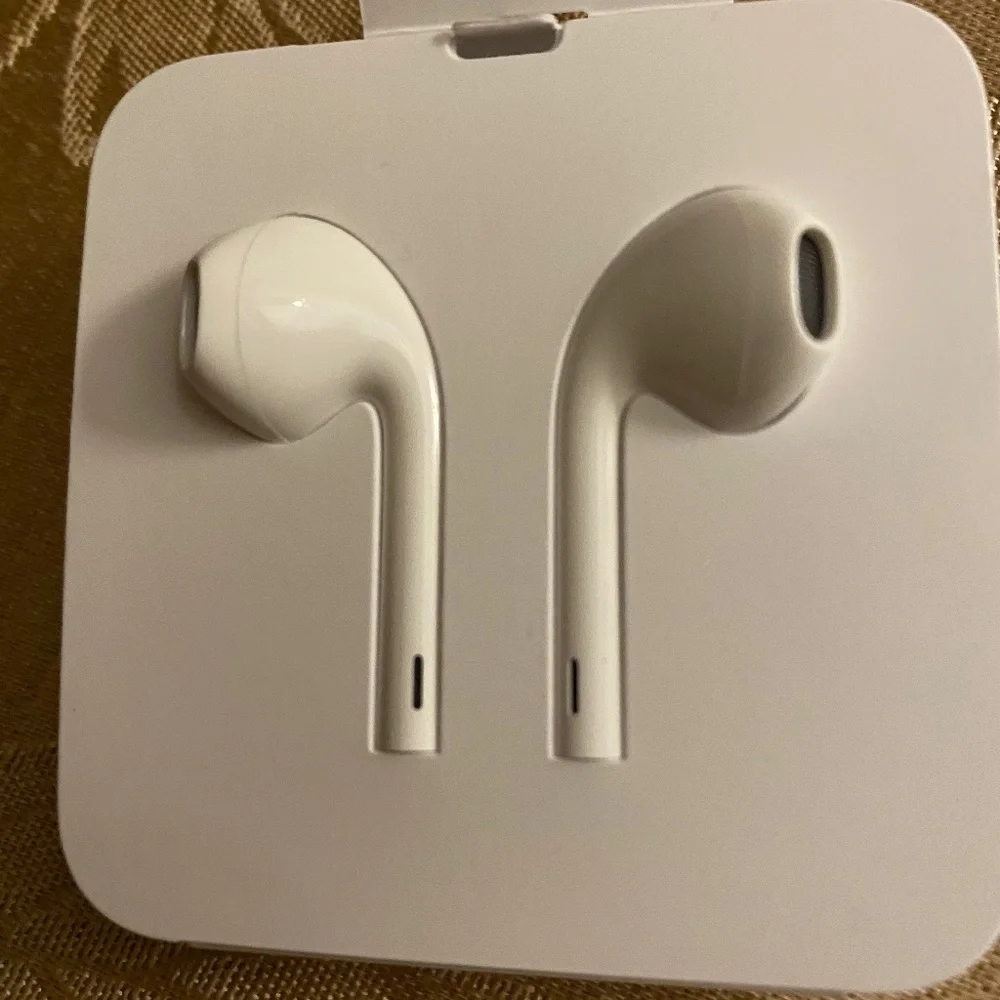 New Apple Ear pods wired with 2 pair of covers.
